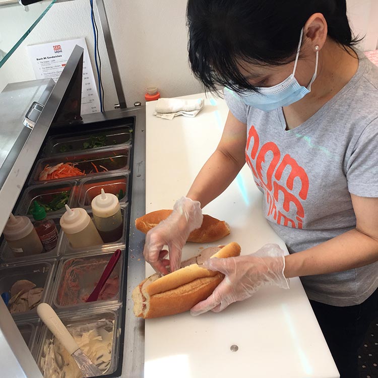 Chef Tram making banh mi